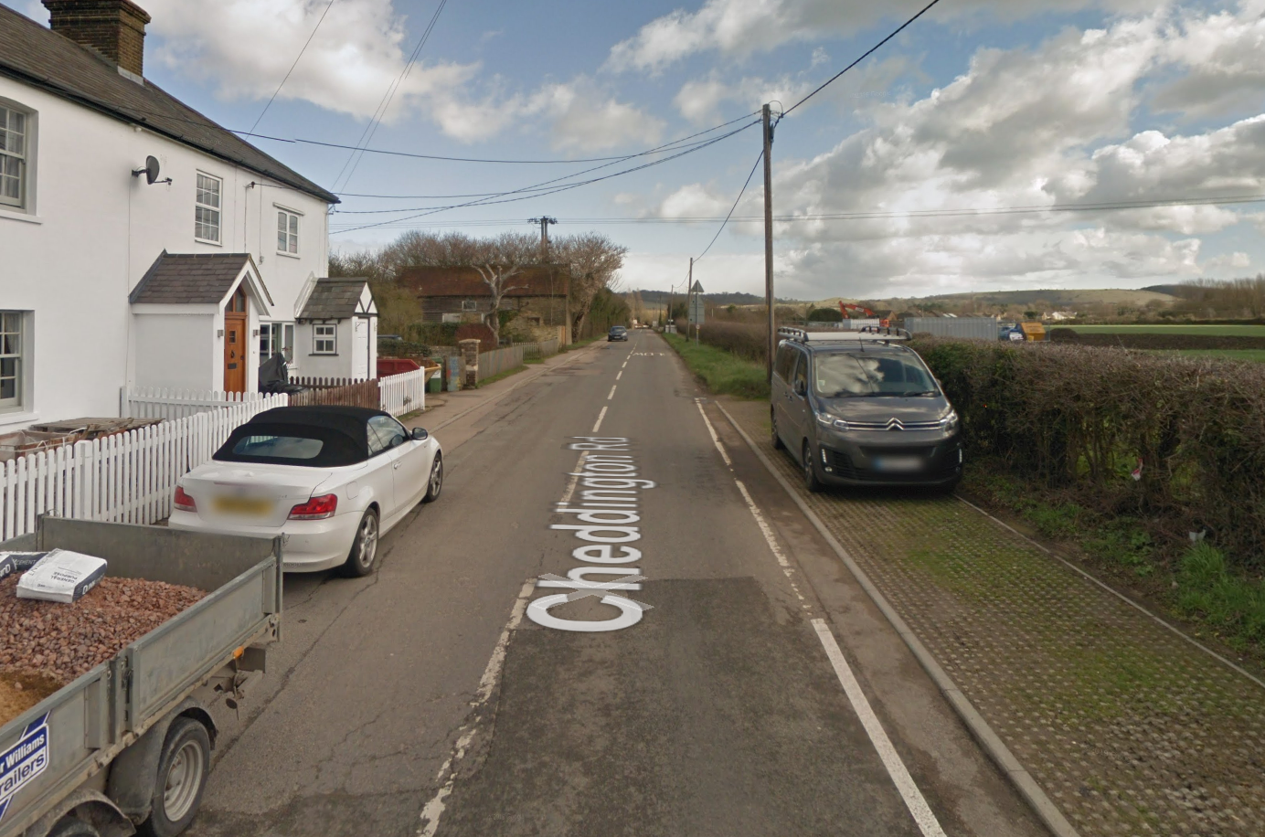 Cheddington Road south of bend showing on and off street parking and lack of street lighting.